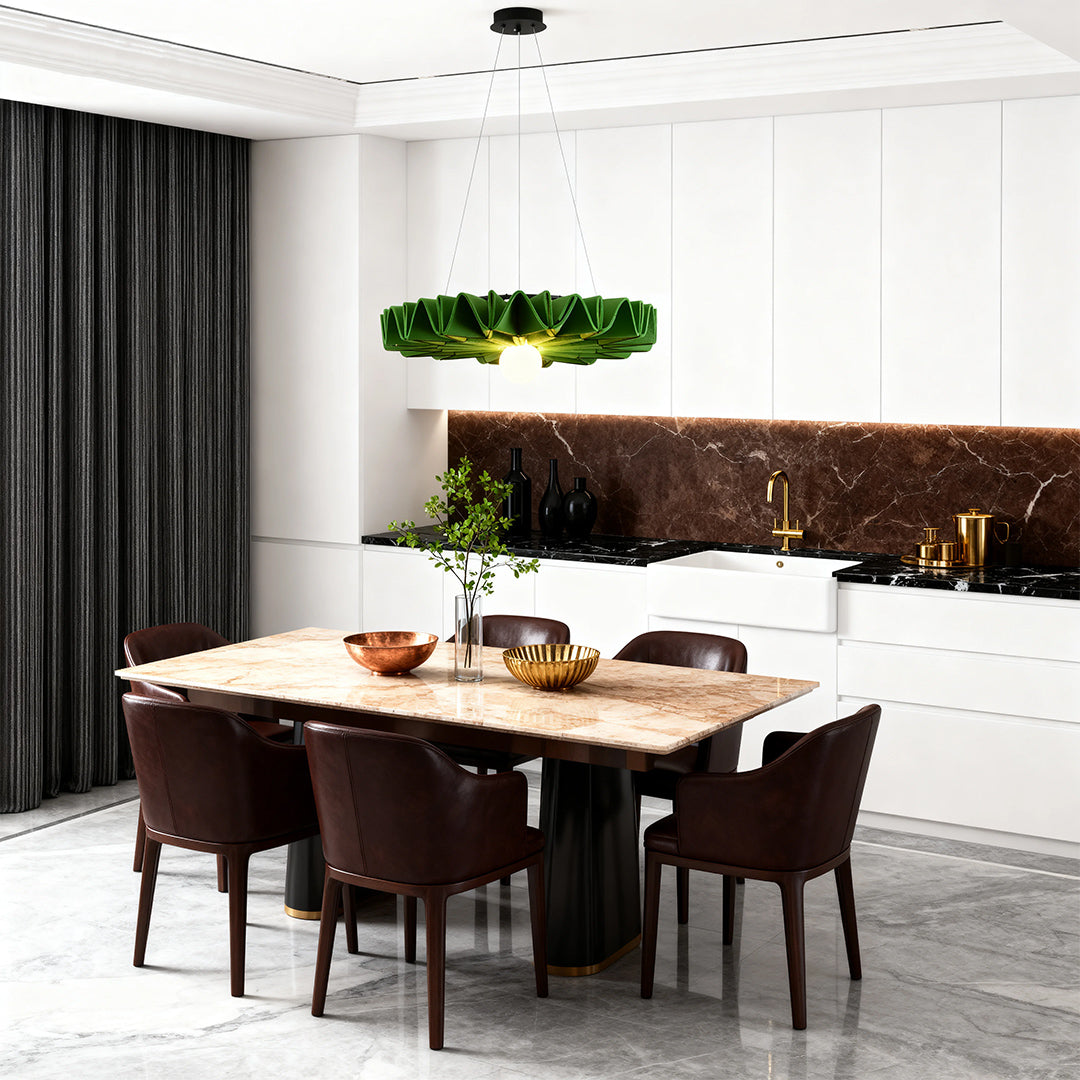 Bright green pleated cloth chandelier hanging above a marble dining table in a contemporary kitchen