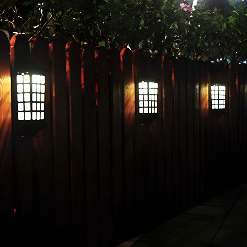 Solar light outdoor wall mounted on a fence, enhancing outdoor pathway visibility and safety.