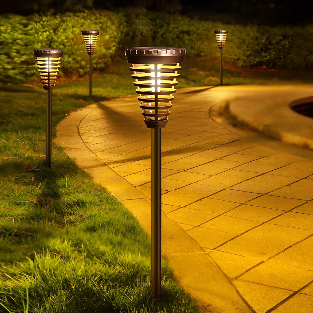 Solar torch light with a sleek design, providing soft illumination in a backyard.